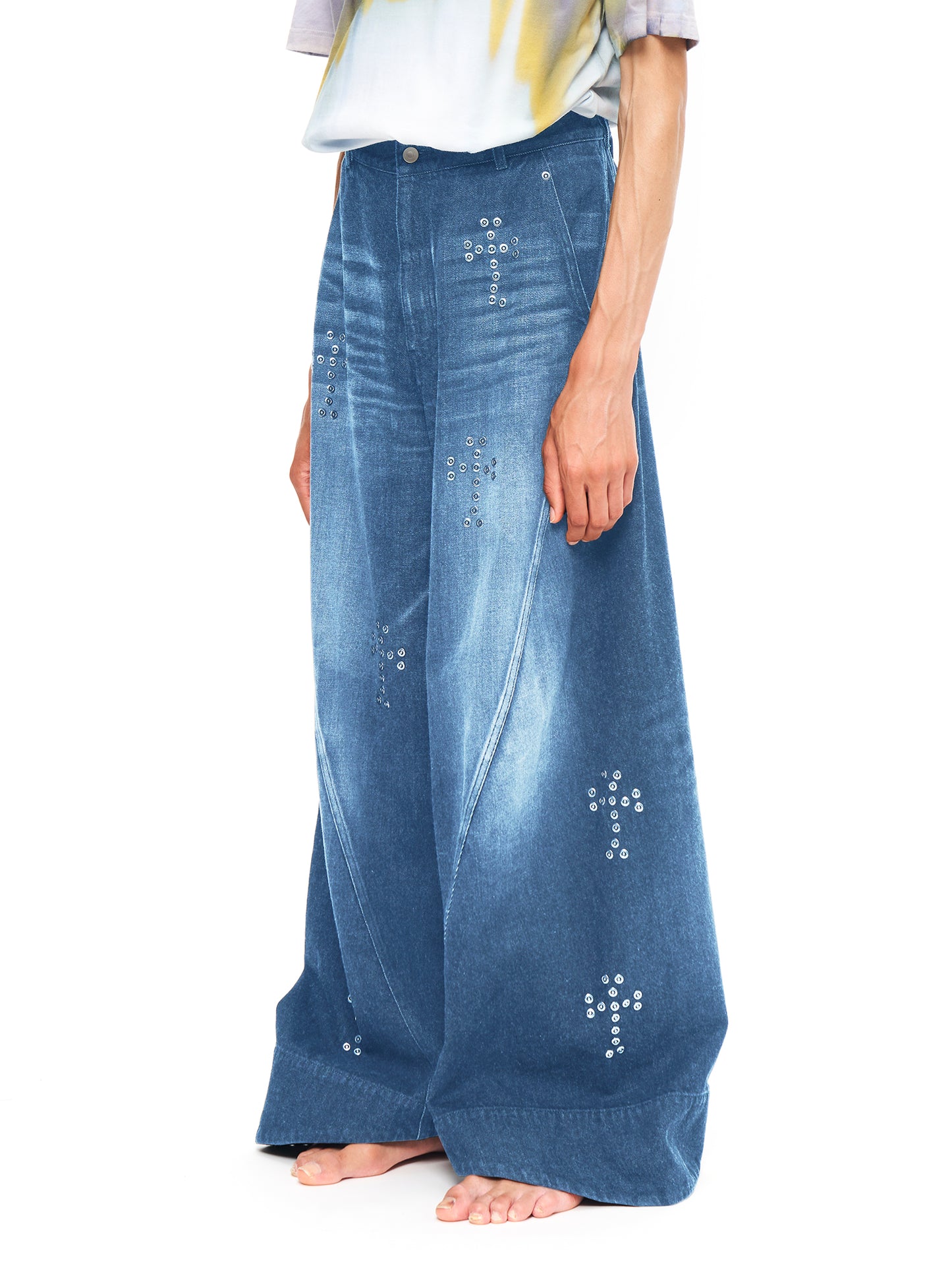 BAGGY TWISTED JEANS WITH CROSS RIVET INDIGO