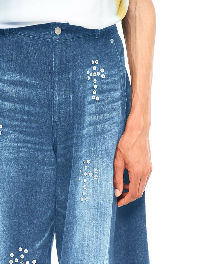 BAGGY TWISTED JEANS WITH CROSS RIVET INDIGO